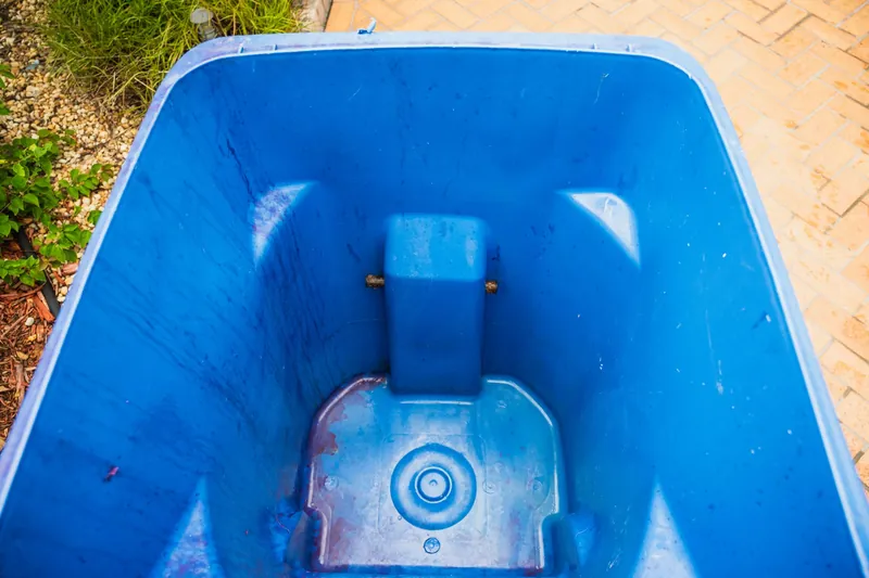 Inside of a residential trash can after a sanitizing wash